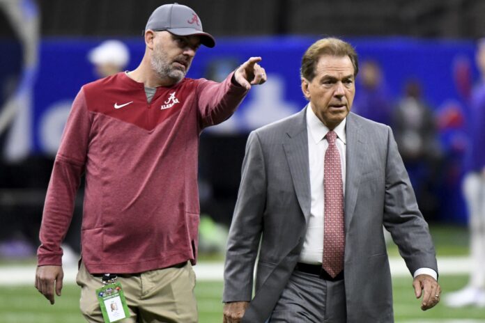 Nick Saban walks around in the stadium before the 2022 Sugar Bowl.