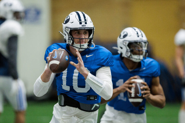 BYU quarterback Kedon Slovis goes through drills during spring football practice.