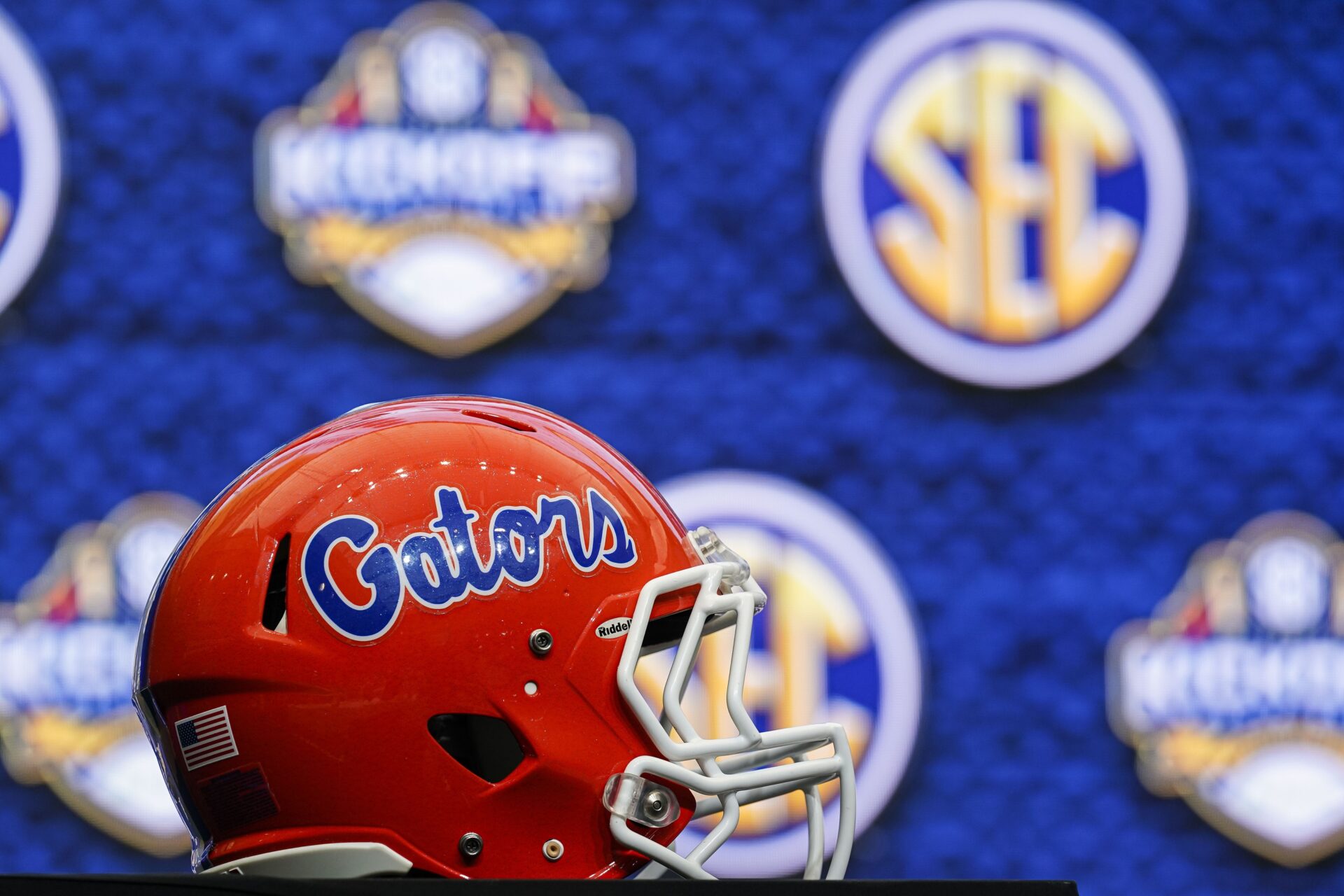 The Florida Gators helmet shows on display at the College Football Hall of Fame.