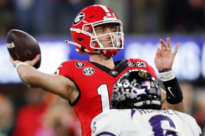 Georgia QB Carson Beck (15) attempts a pass against TCU in the National Championship Game.