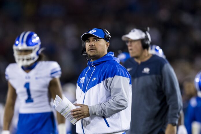 BYU Cougars head coach Kalani Sitake looks on during a timeout.