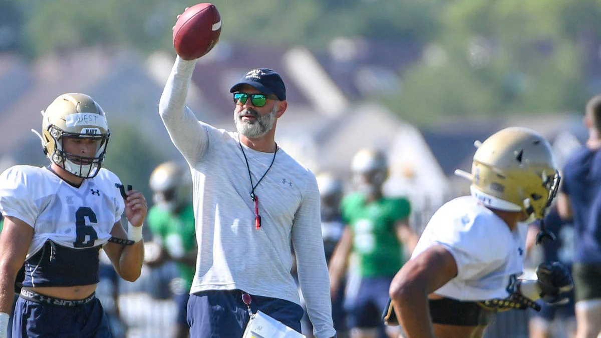 Navy head coach Brian Newberry leads practice.