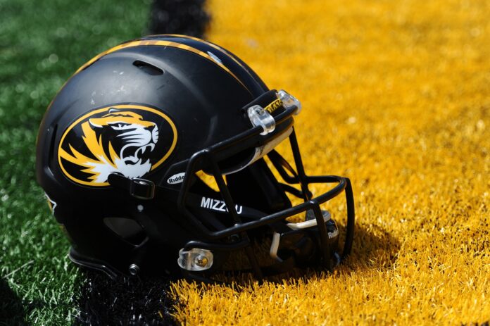 Missouri Tigers helmet placed on the field.