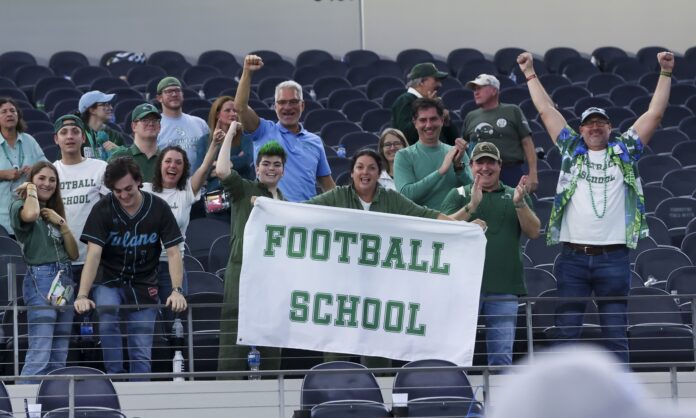 Tulane fans cheer after the team's win against USC in the Cotton Bowl.