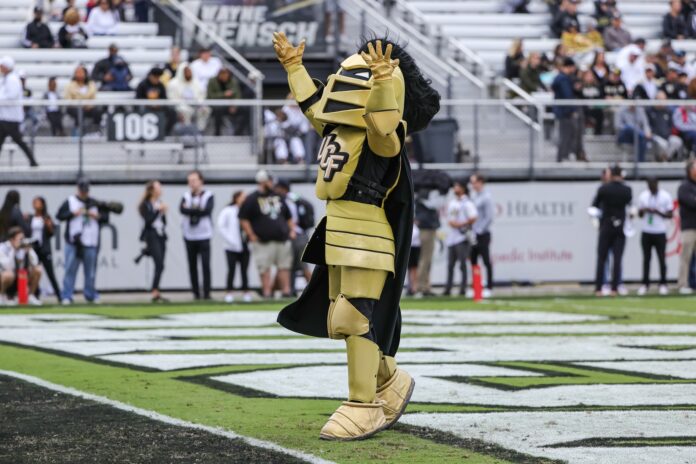 UCF Knights mascot Nightro interacts with fans before the game against the Tulane Green Wave at Bounce House.