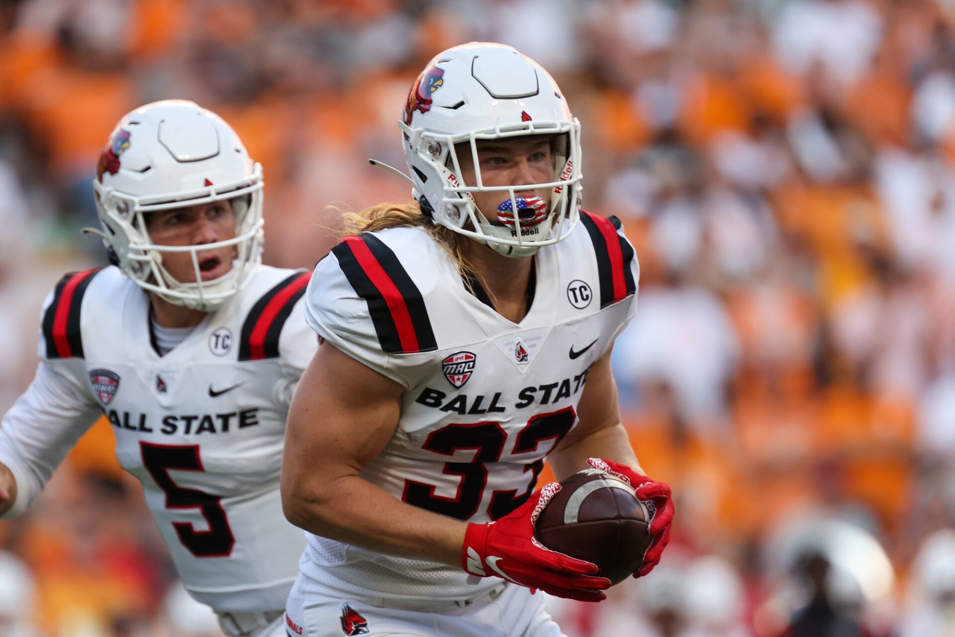Carson Steele runs with the ball against the Tennessee Volunteers.