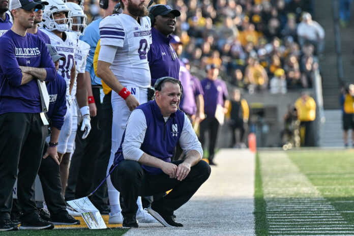 Who replaces Pat Fitzgerald at Northwestern?
