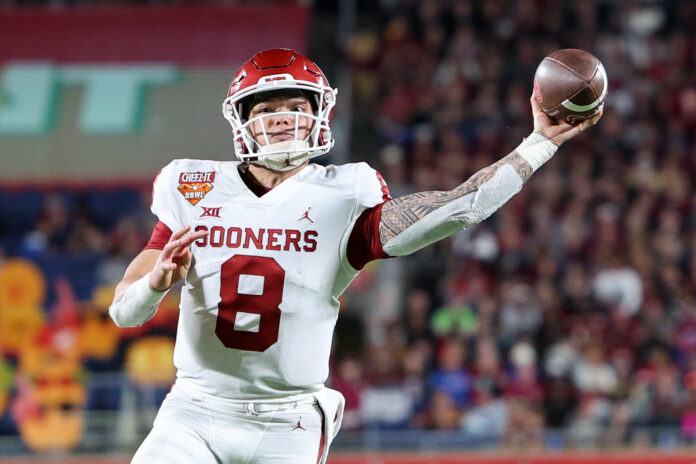 Oklahoma Sooners quarterback Dillon Gabriel (8) throws a pass against the Florida State Seminoles in the fourth quarter during the 2022 Cheez-It Bowl at Camping World Stadium.