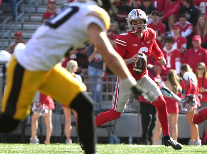 Oct 22, 2022; Columbus, Ohio, USA; Ohio State Buckeyes quarterback Kyle McCord (6) looks for a pass in the fourth quarter of the NCAA Division I football game between the Ohio State Buckeyes and the Iowa Hawkeyes at Ohio Stadium. Mandatory Credit: Brooke LaValley/Columbus Dispatch