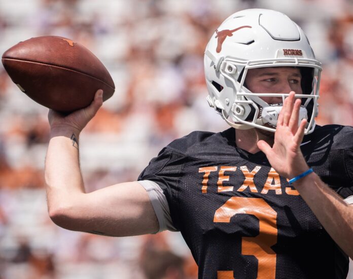 Texas quarterback Quinn Ewers (3) warms up ahead of the Longhorn's Orange and White spring football game in Darrell K Royal-Texas Memorial Stadium, Saturday, April 15, 2023. Texas Longhorns Orange And White Spring Game Sed 205