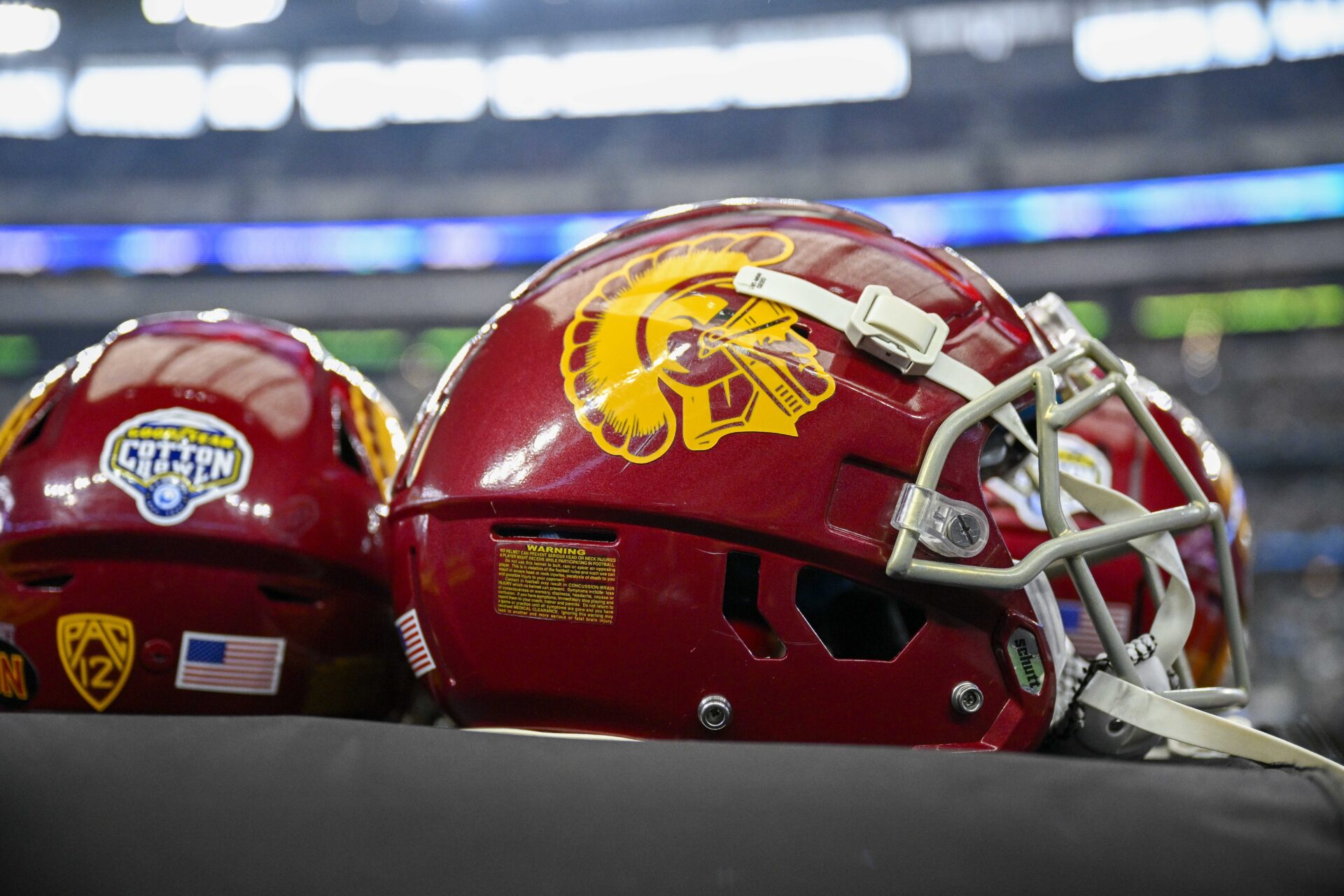 A view of the USC Trojans helmets and Cotton Bowl logo during the game between the USC Trojans and the Tulane Green Wave in the 2023 Cotton Bowl at AT&T Stadium.