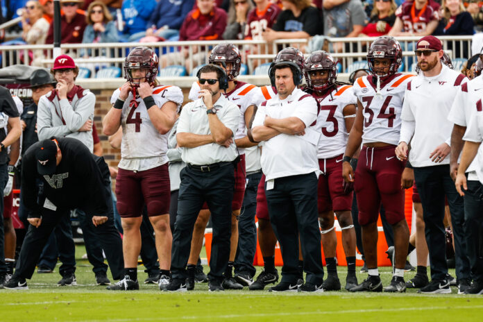 The Virginia Tech coaching staff is led by Brent Pry
