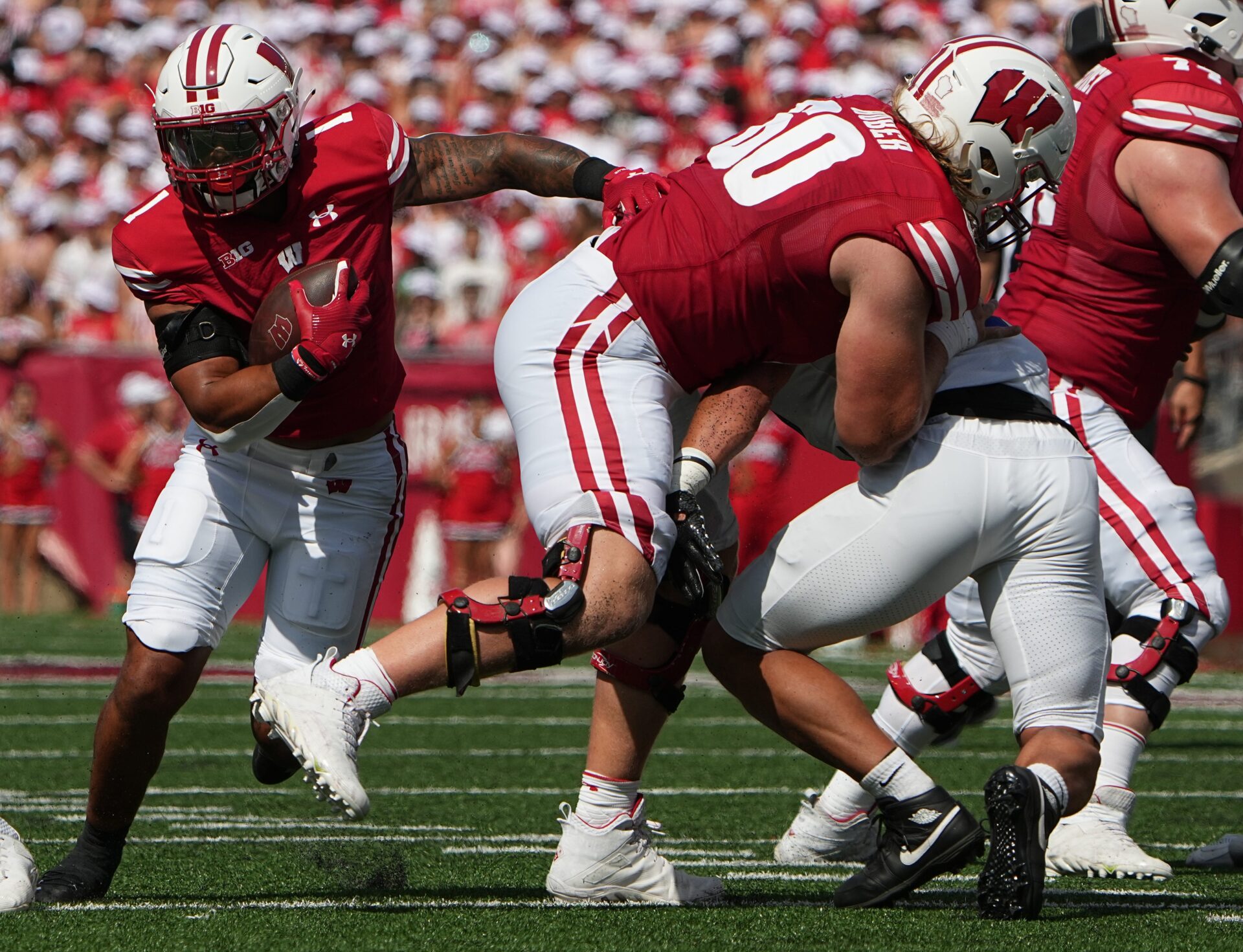When is the Wisconsin vs. Washington State game on Saturday?