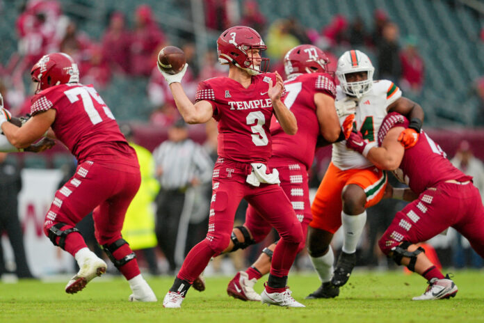 ; Temple Owls quarterback E.J. Warner (3) drops back to pass in the third quarter against the Miami Hurricanes at Lincoln Financial Field.
