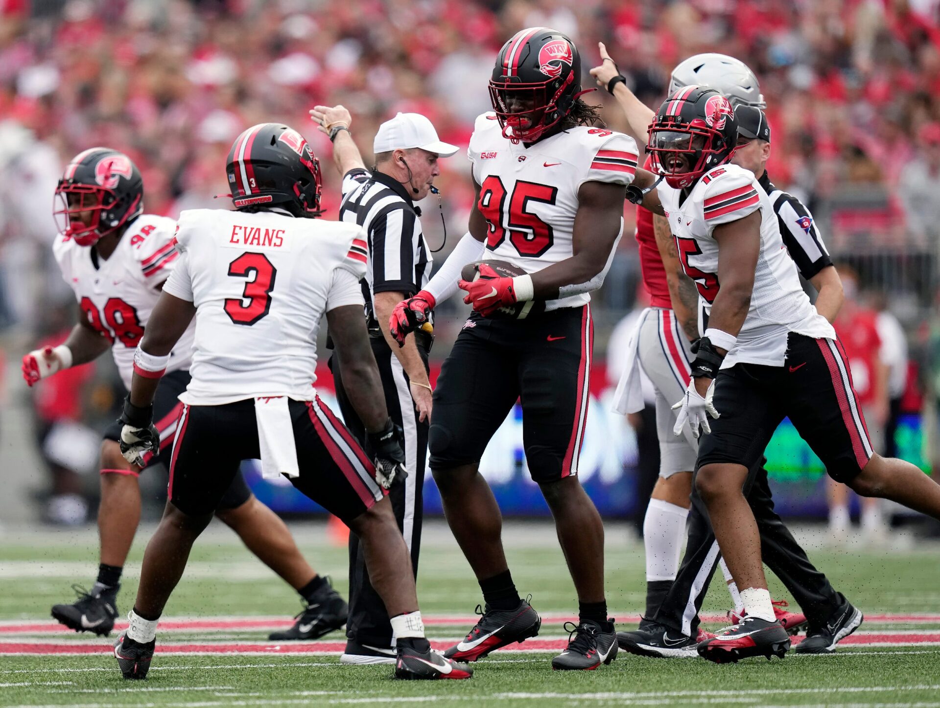 Western Kentucky Hilltoppers defensive end Deante McCray (95) celebrates after recovering Ohio State Buckeyes quarterback Kyle McCord (6) fumble during the first quarter of their game at Ohio Stadium.