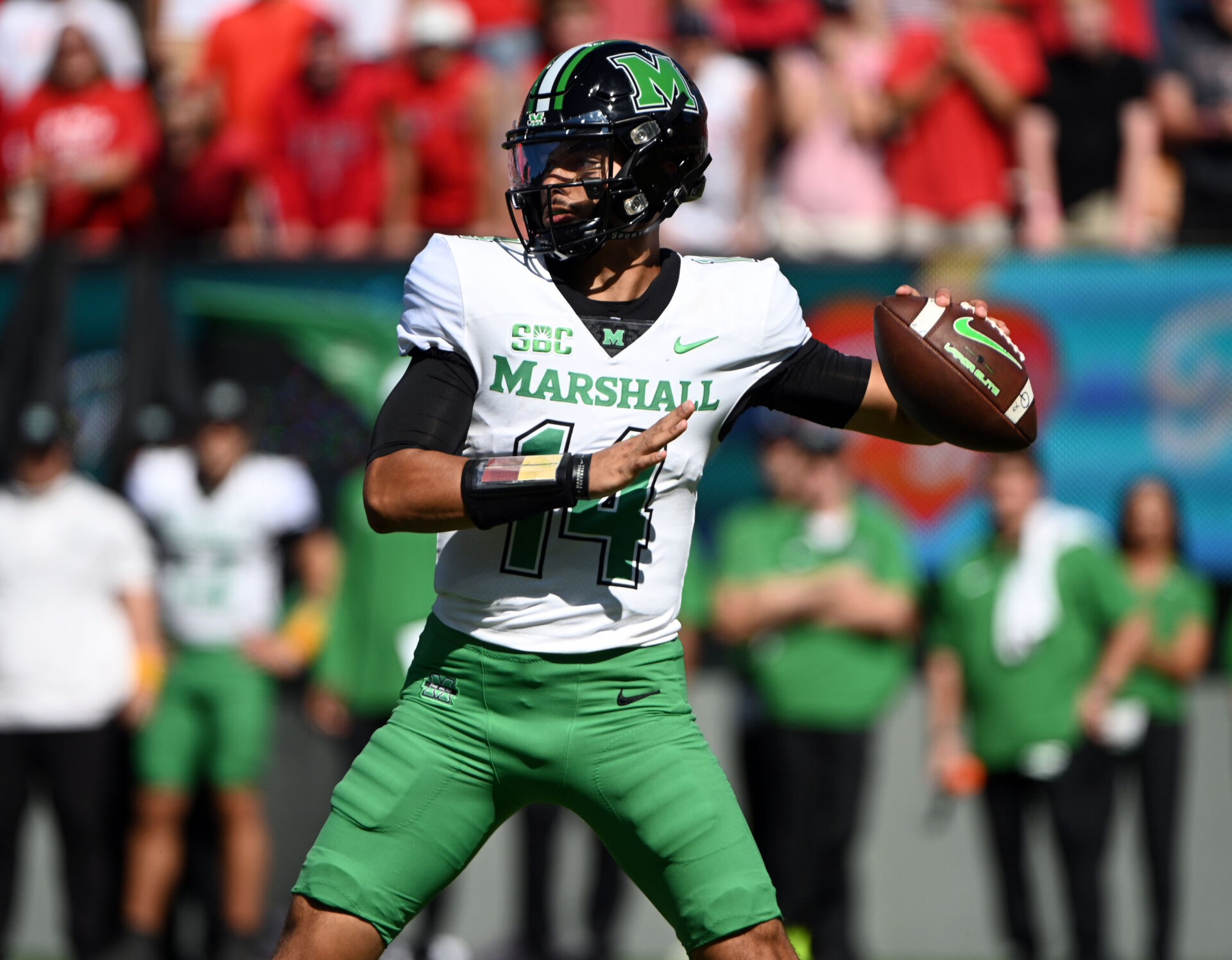 Marshall Thundering Herd quarterback Cam Fancher (14) looks to throw during the first half against the North Carolina State Wolfpack at Carter-Finley Stadium.