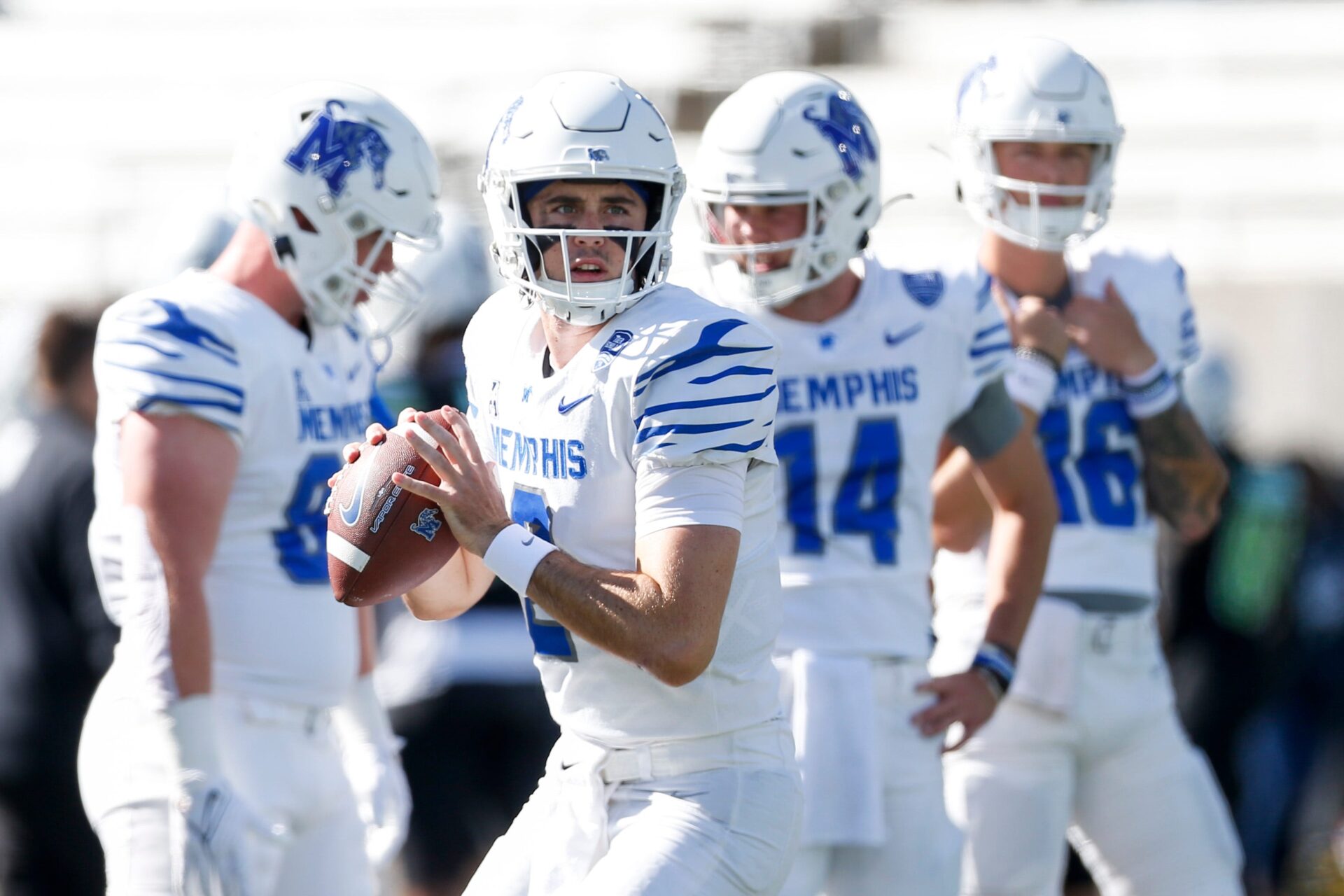 Seth Henigan battled through adversity and led Memphis to 600 yards of total offense in coming from behind to defeat North Texas.