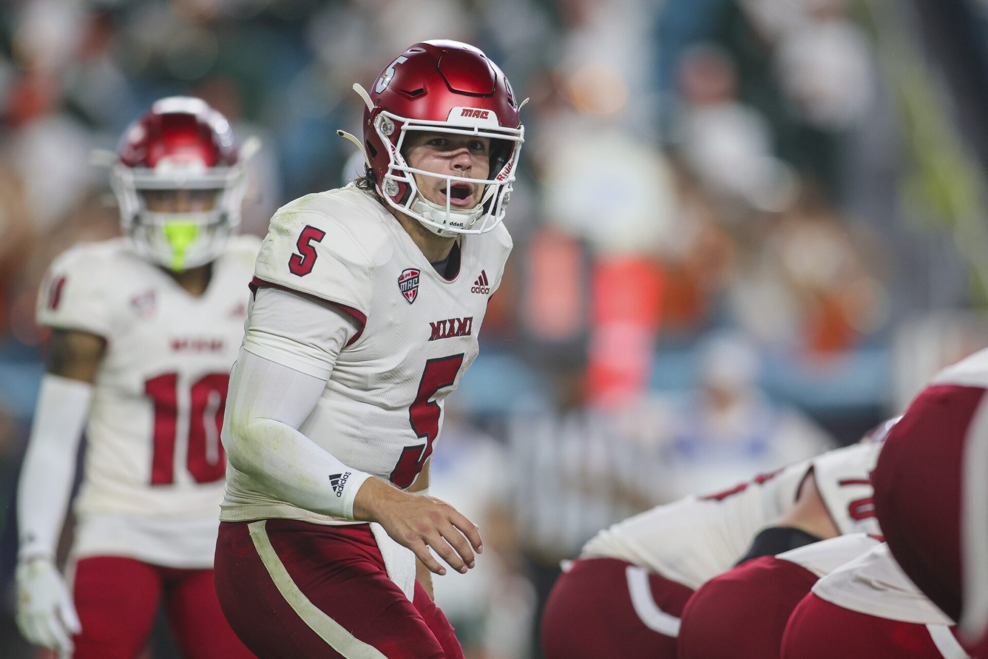 Miami Redhawks quarterback Brett Gabbert (5) reacts prior to a play against the Miami Hurricanes.