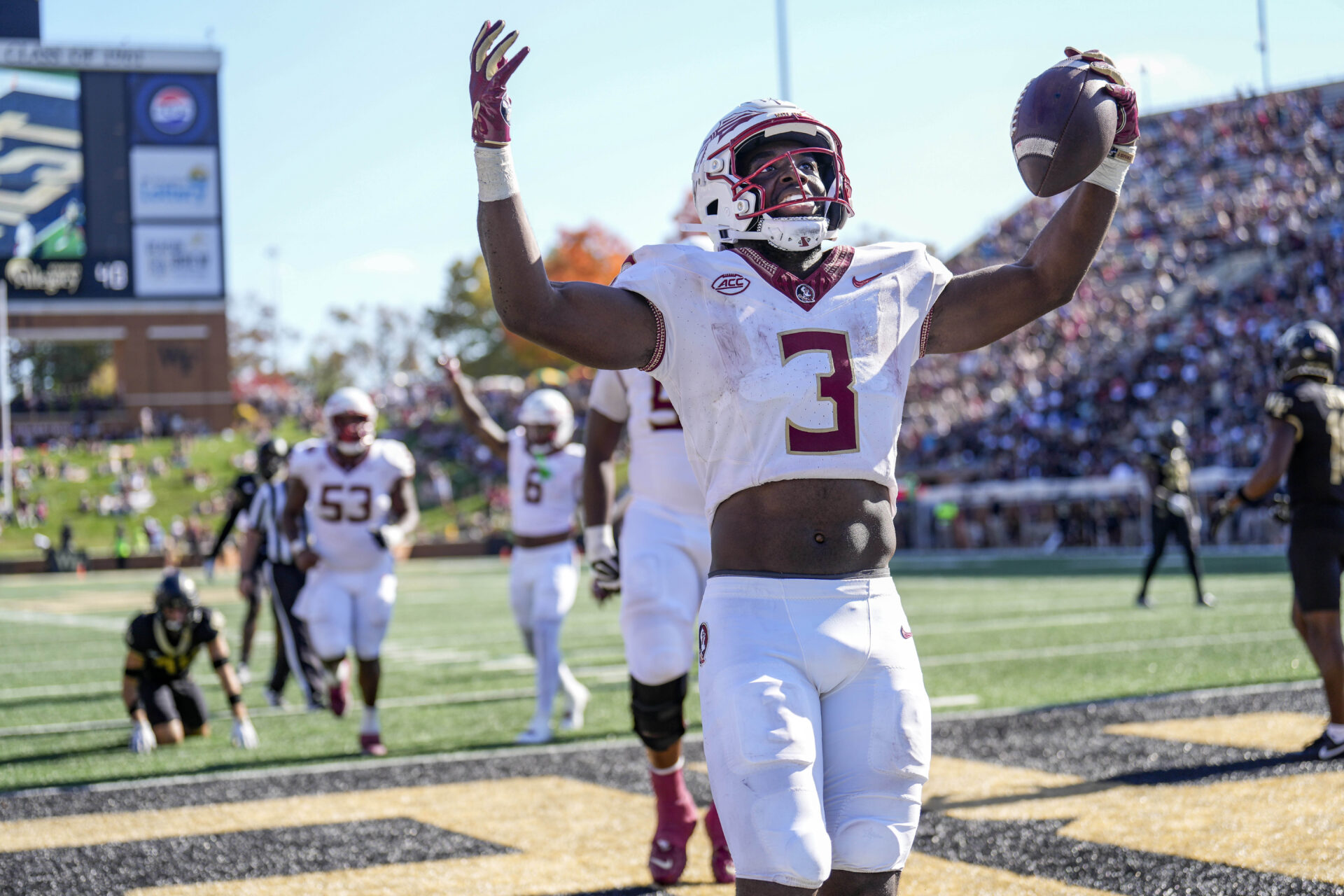 Florida State Seminoles running back Trey Benson (3) celebrates after scoring against the Wake Forest Demon Deacons during the second half at Allegacy Federal Credit Union Stadium.
