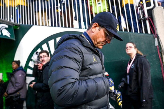 The Big Ten announced a suspension of Michigan head coach Jim Harbaugh Friday evening. Why was he suspended and what is Michigan's response to this action?
