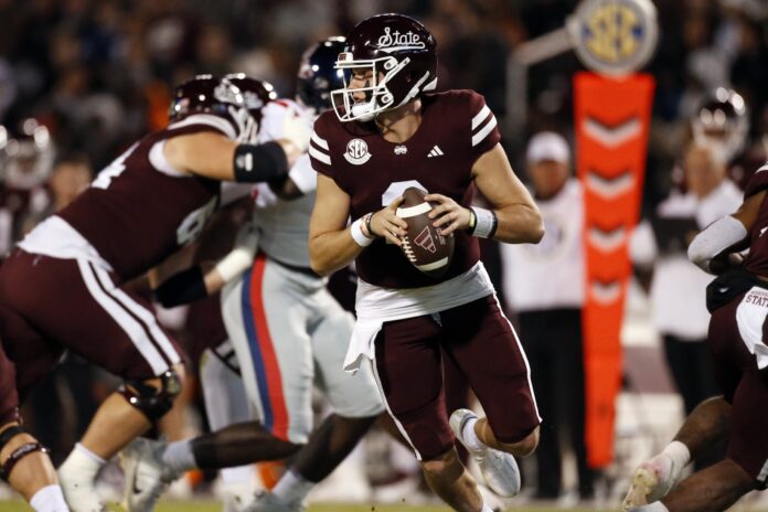 Mississippi State Bulldogs quarterback Will Rogers (2) drops back to pass during the first half against the Mississippi Rebels at Davis Wade Stadium at Scott Field.