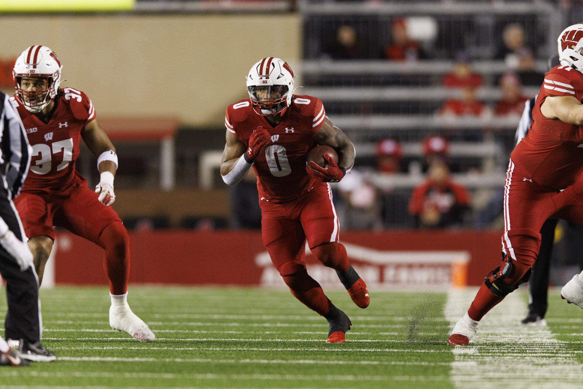 Wisconsin Badgers running back Braelon Allen (0) rushes with the football during the second quarter against the Ohio State Buckeyes at Camp Randall Stadium.