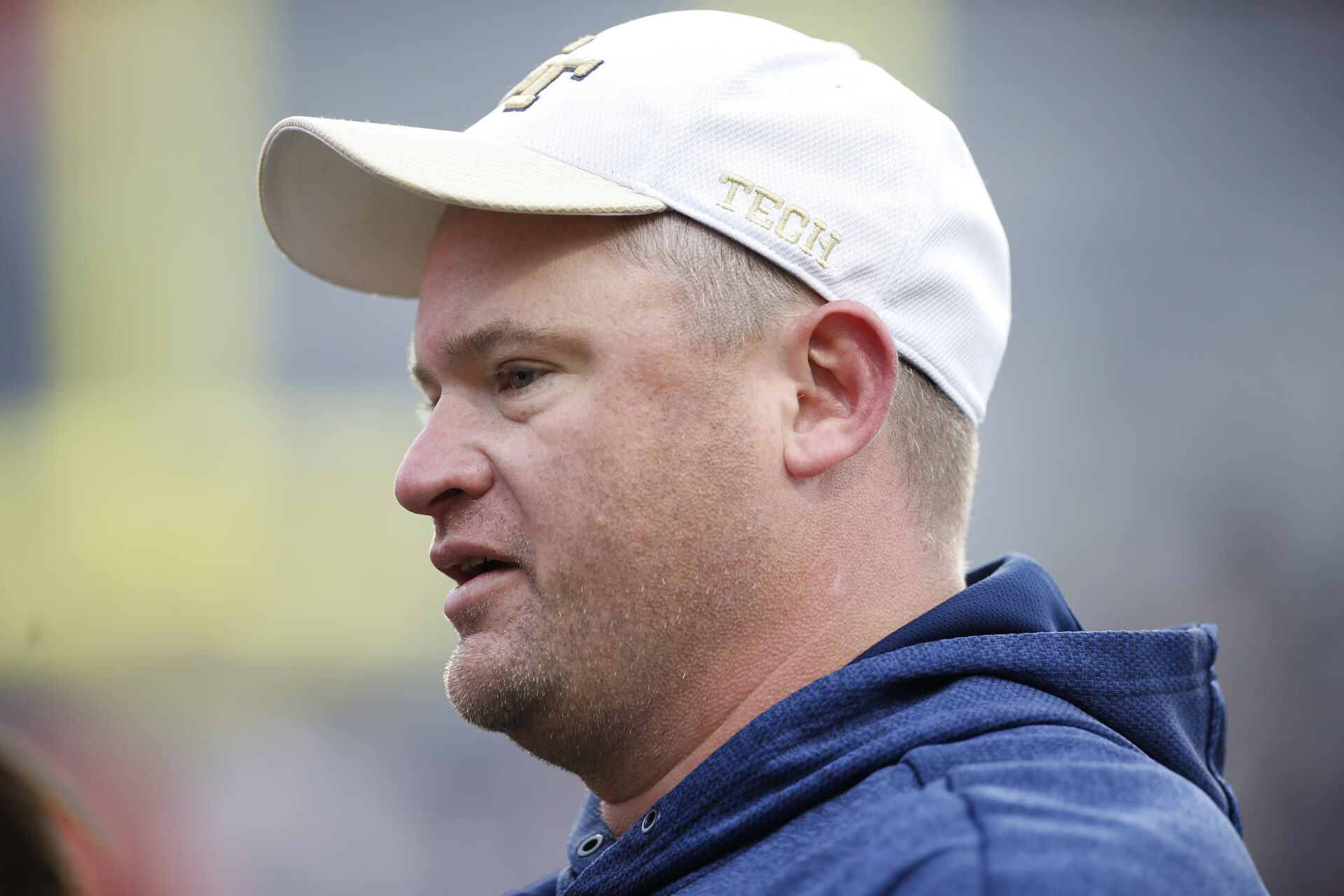 Georgia Tech Yellow Jackets head coach Brent Key walks off the field after defeating the Virginia Cavaliers at Scott Stadium.