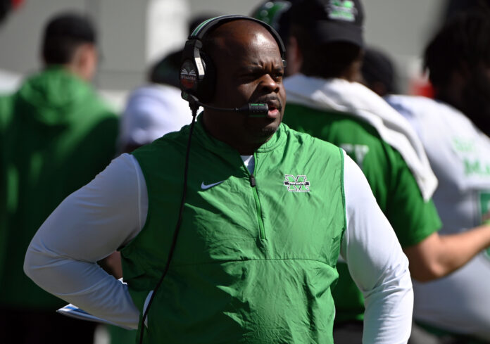 Marshall Thundering Herd head coach Charles Huff looks on during the first half against the North Carolina State Wolfpack at Carter-Finley Stadium.