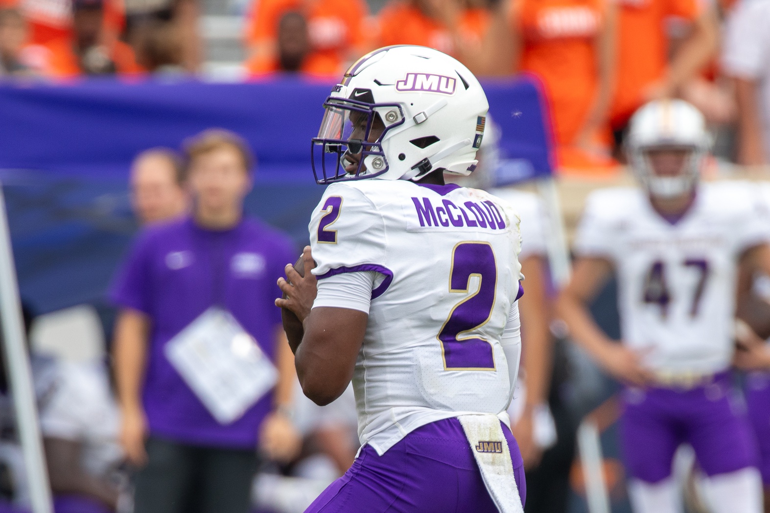 James Madison Dukes quarterback Jordan McCloud (2) looks for a pass to an open player during the second half of the game against the Virginia Cavaliers.