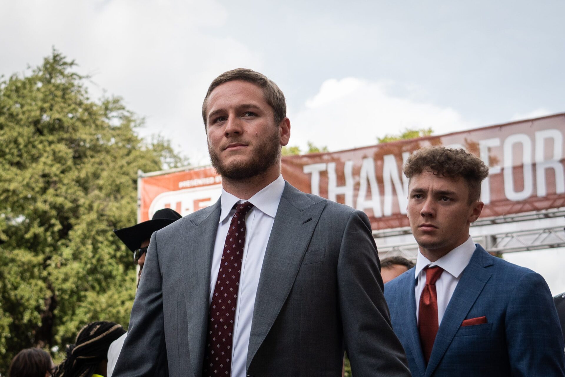 Texas quarterback Quinn Ewers walks into the stadium on Bevo Boulevard ahead of the Longhorns' game against the BYU Cougars at Darrell K Royal-Texas Memorial Stadium.