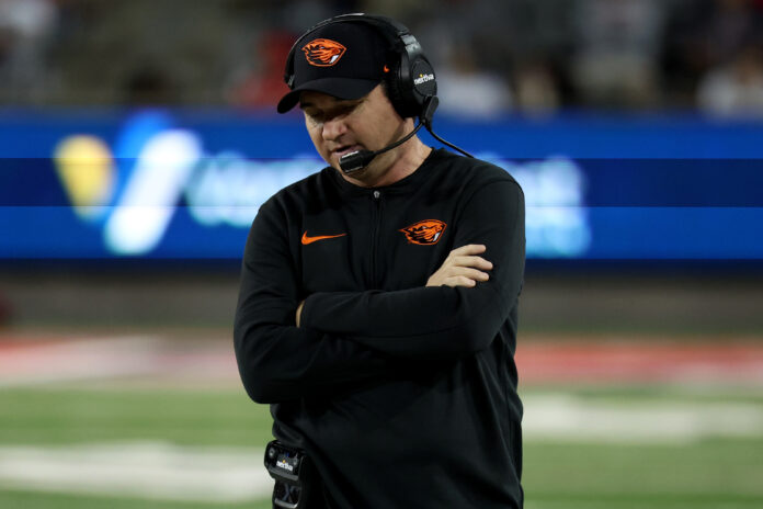 Oregon State Beavers head coach Jonathan Smith on the sidelines during the second half at Arizona Stadium.