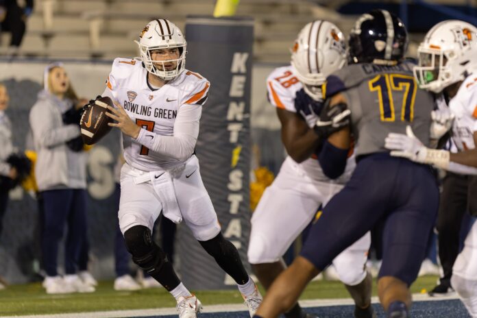 Bowling Green quarterback Connor Bazelak scrambles with the ball during Wednesday night’s MAC conference game against the Kent State University Golden Flashes.