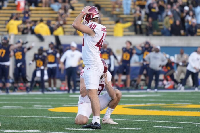 Washington State Cougars place kicker Dean Janikowski (49) reacts after missing a field goal against the California Golden Bears.