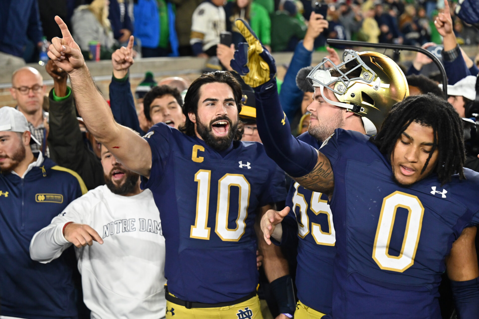 Notre Dame Fighting Irish quarterback Sam Hartman (10) celebrates after Notre Dame defeated the USC Trojans at Notre Dame Stadium.