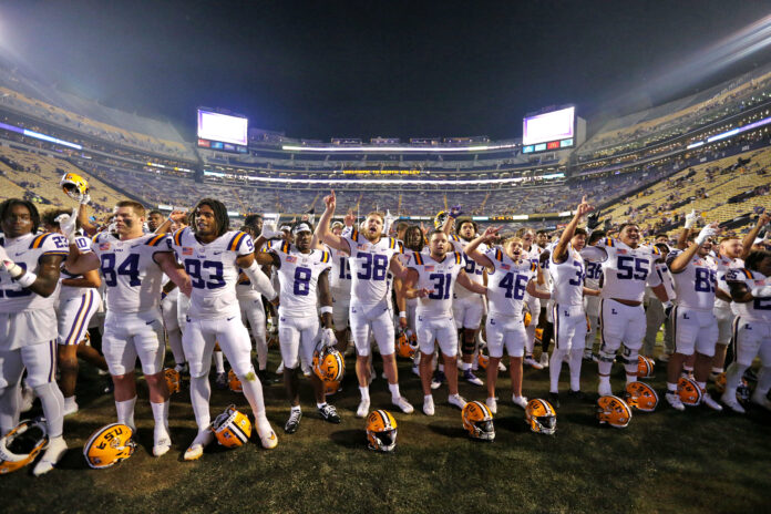 The LSU Tigers celebrate a 62-0 win against the Army Black Knights at Tiger Stadium.