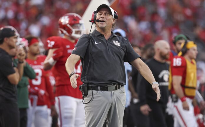 Houston Cougars head coach Dana Holgorsen reacts after a play during the fourth quarter against the Texas Longhorns at TDECU Stadium.