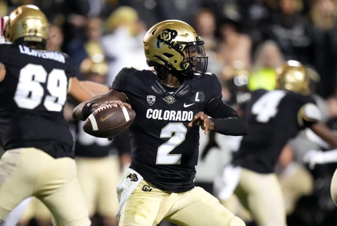 Colorado Buffaloes quarterback Shedeur Sanders (2) prepares to pass in the first half against the Stanford Cardinal at Folsom Field.