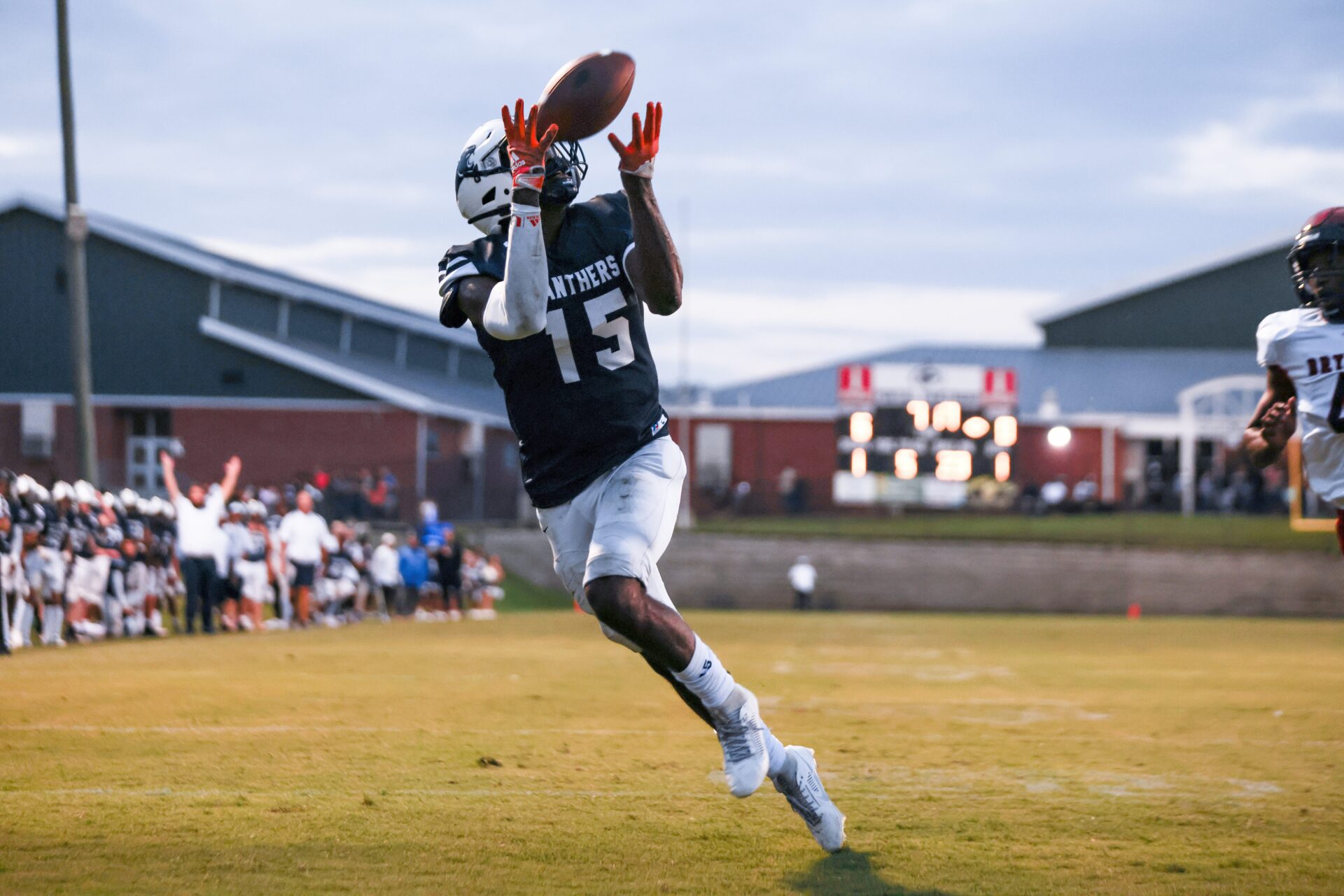 Panthers wide receiver #15 Amir Jackson catches a deep pass and scores the first touchdown of the Friday night game between The Bryan County Redskins and the Portal Panthers in Portal, GA.