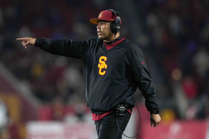 Southern California Trojans head coach Donte Williams gestures in the second half against the BYU Cougars at United Airlines Field at Los Angeles Memorial Coliseum.