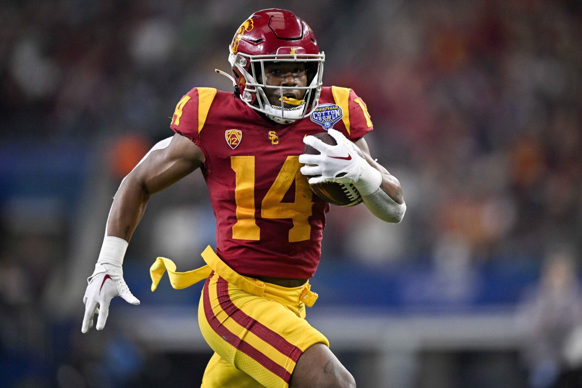 USC Trojans running back Raleek Brown (14) in action during the game between the USC Trojans and the Tulane Green Wave in the 2023 Cotton Bowl at AT&T Stadium.