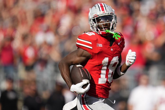 Is Ohio State WR Marvin Harrison Jr. set to return to school in 2024, or will he declare for the 2024 NFL Draft? Here's what we know, and what factors in.
