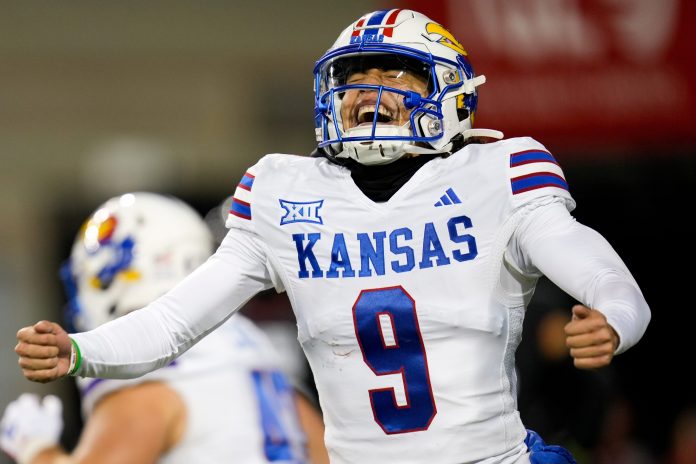 Which Kansas and UNLV players are expected to be missing from the Guaranteed Rate Bowl when Kansas and UNLV square off?