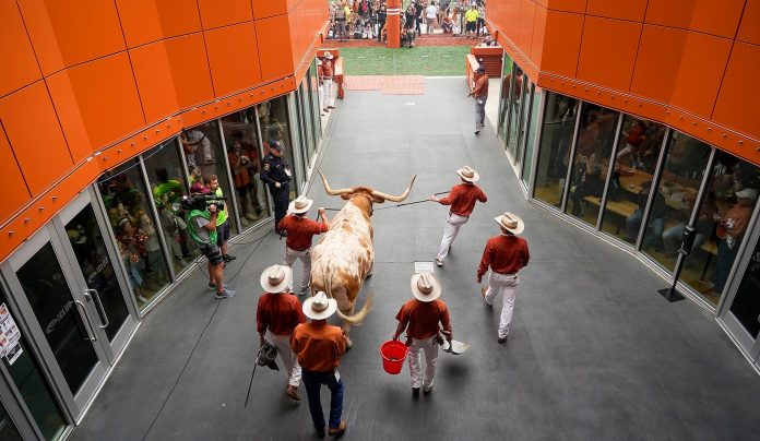 Texas' mascot Bevo is one of the most instantly recognizable in college sports. How he got his name is a fascinating and disputed tale.