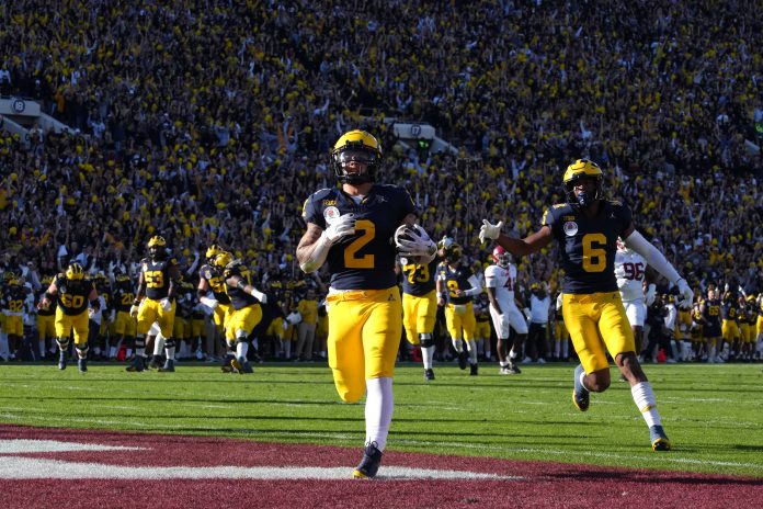 After dominating the first century of the sport, the Michigan Wolverines' playoff history is still being written with three straight appearances in the CFP.