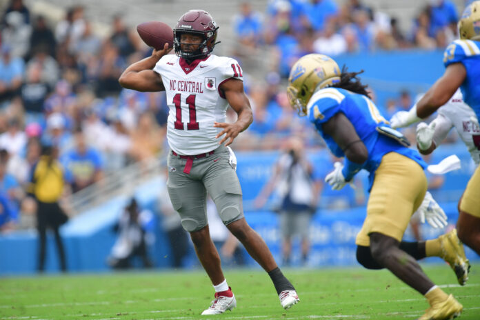 North Carolina Central Eagles quarterback Davius Richard (11) throws against the UCLA Bruins during the first half at Rose Bowl.