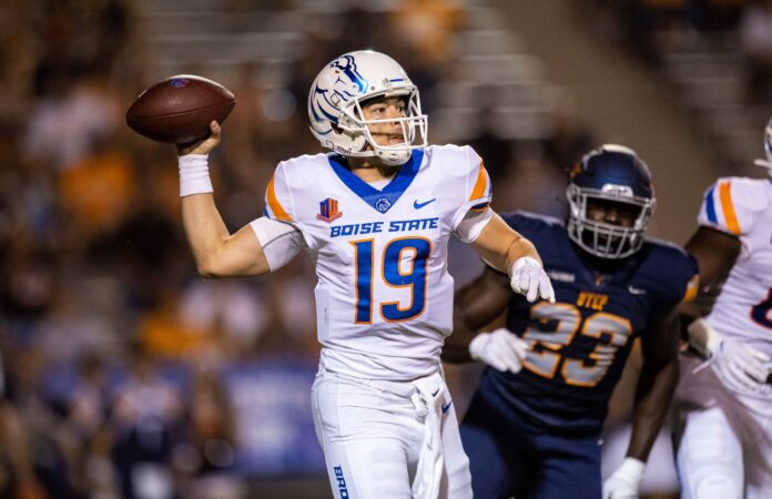 Boise State quarterback Hank Bachmeier (19) against the UTEP Miners defense in the first half at the Sun Bowl.