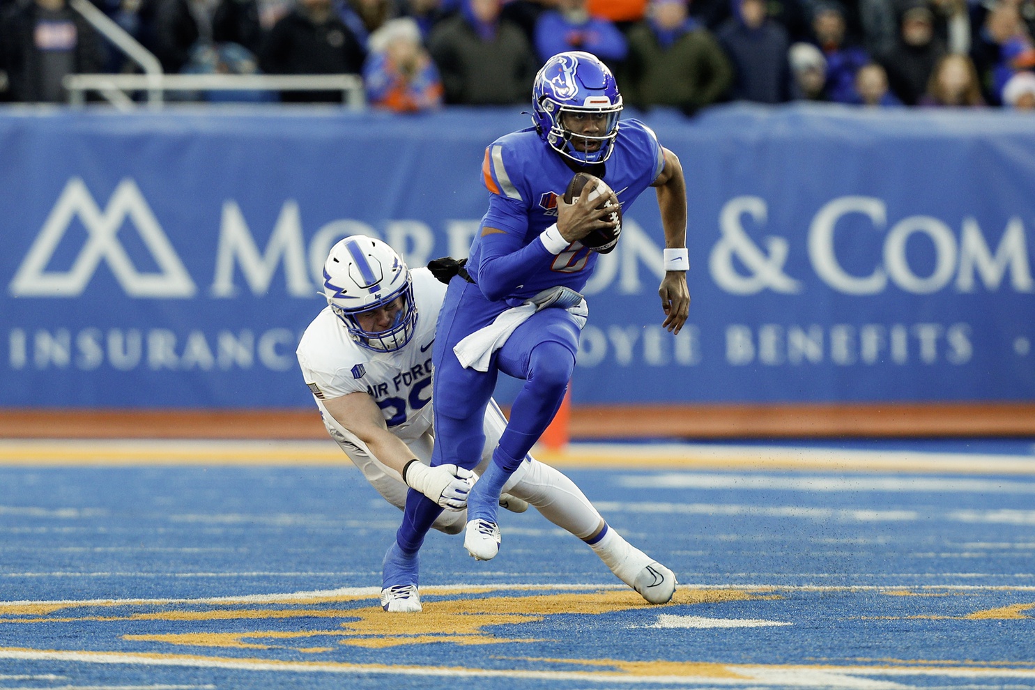 Boise State Broncos quarterback Taylen Green (10) scrambles during the second half against the Air Force Falcons at Albertsons Stadium. Boise State defeats Air Force 27-19.