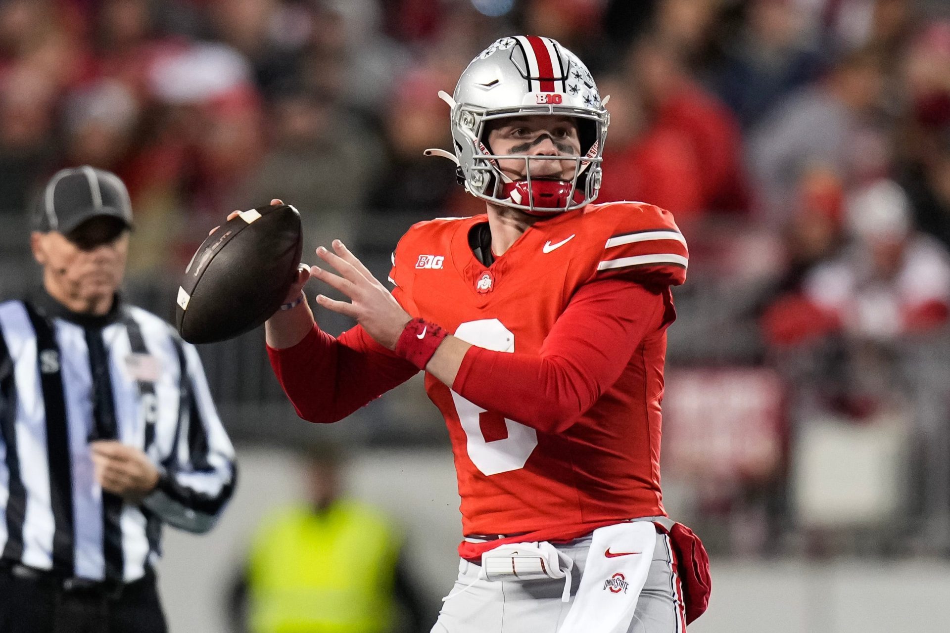 Ohio State quarterback Kyle McCord looks to pass during a game against Minnesota at Ohio Stadium