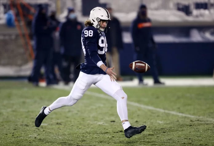 Penn State punter Alex Bacchetta punts the ball away before a Penn State Nittany Lions home game.