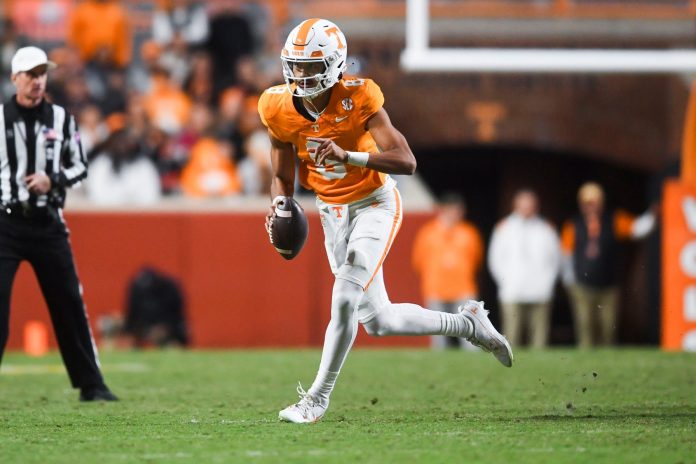 Tennessee quarterback Nico Iamaleava (8) runs with the ball during the NCAA college football game against Vanderbilt on Saturday, November 25, 2023 in Knoxville, Tenn.